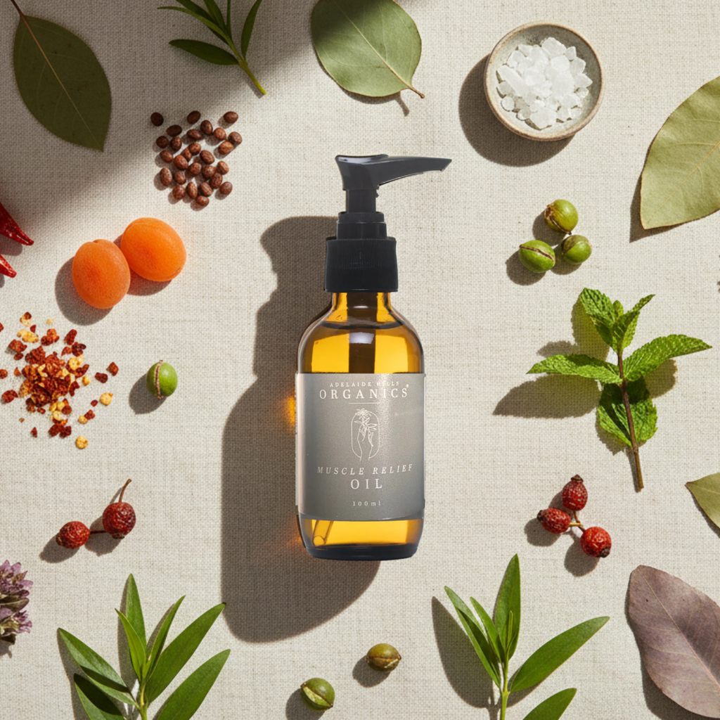 Organic Muscle Relief Oil with peppermint, eucalyptus and capsicum flat lay - Adelaide Hills Organics