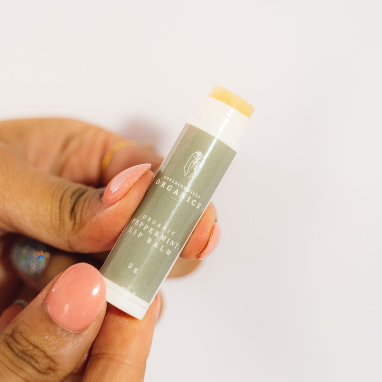 Organic Lip Balm being opened