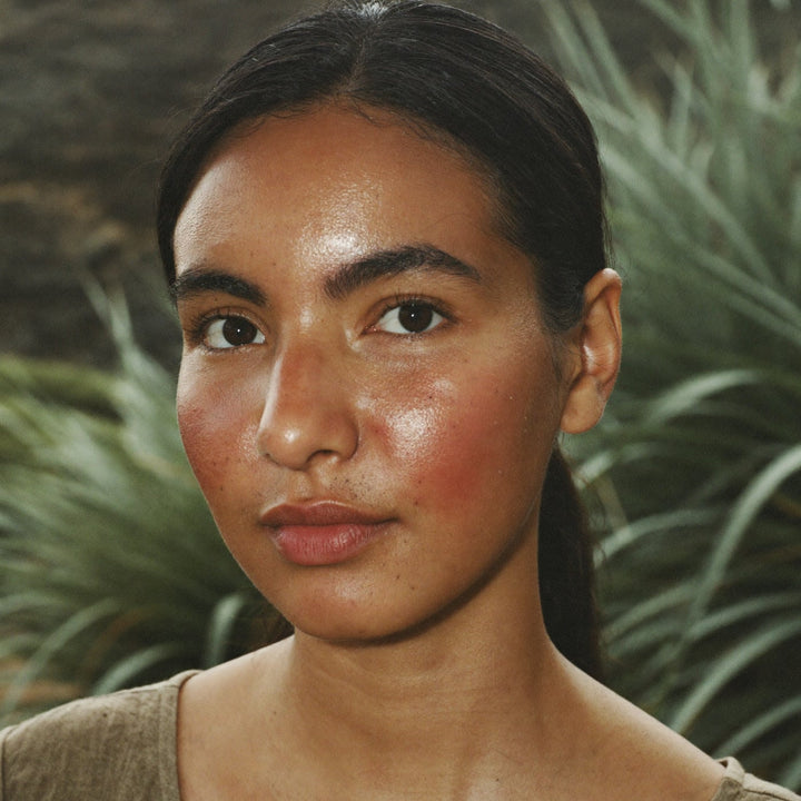 Close-up of a young woman with oily skin