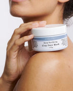 Deep Purifying Clay Face Mask 100g held on the shoulder - Adelaide Hills Organics