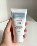 Cleansing Facial Scrub 100ml held in hand - Adelaide Hills Organics